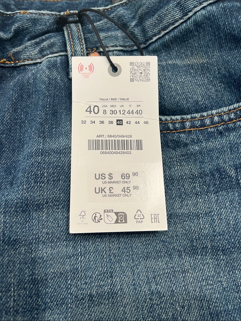 Classic Blue Denim Jeans with Price Tag